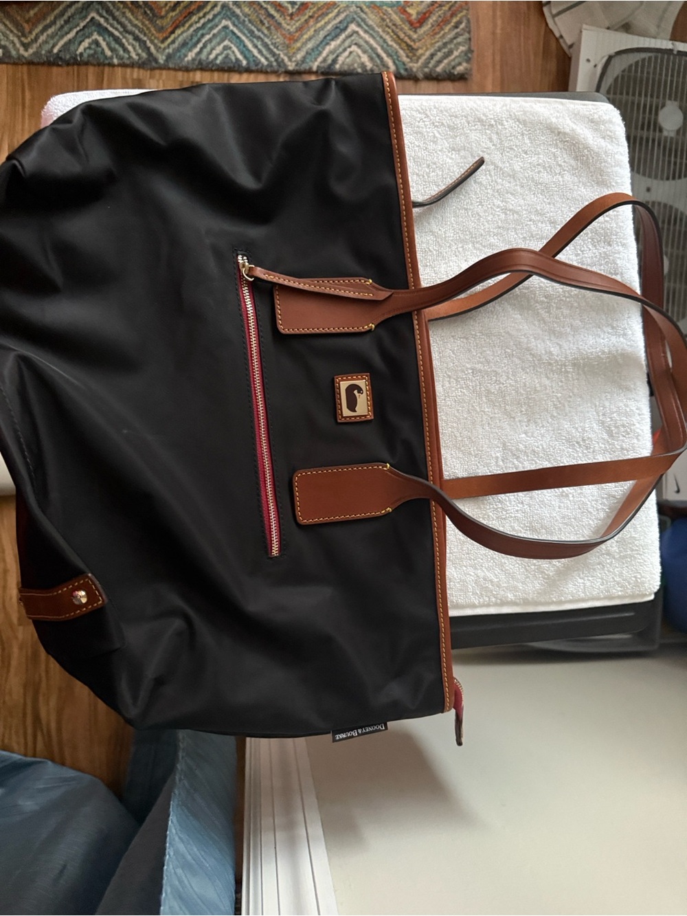 Dooney & Bourke Black Tote with Brown Trim and Red Zip